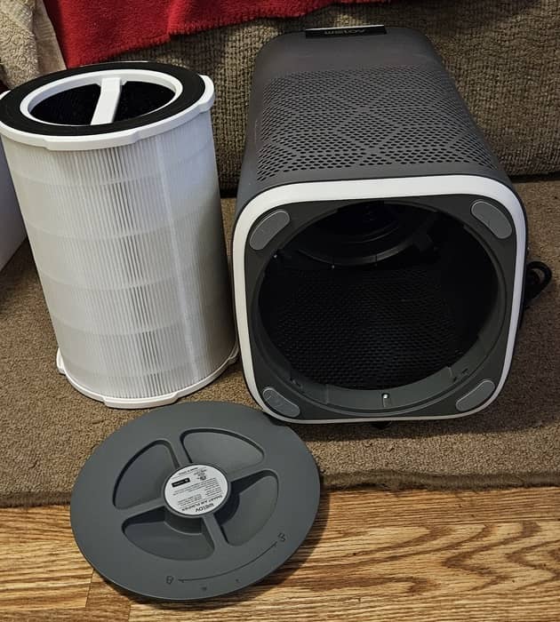 WELOV air purifier on its side with the filter out.