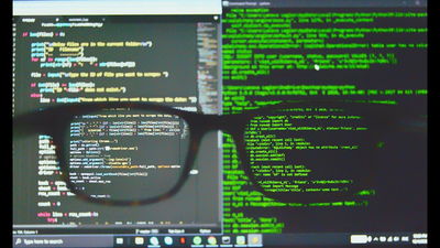 Black Framed Eyeglasses On Computer Screen Feature Image Linux