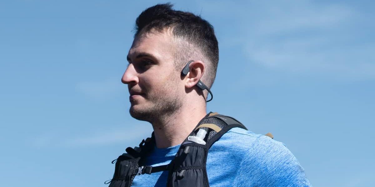 Man Wearing Shokz OpenRun Headphones