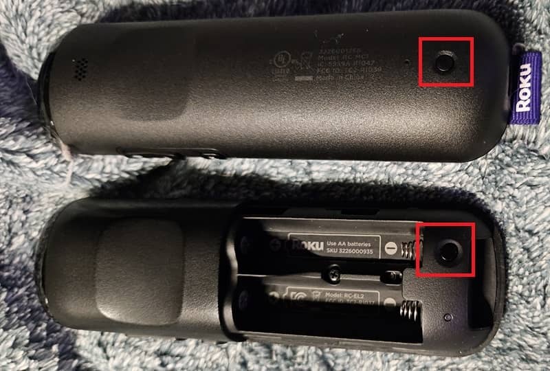 The reset button on the back of two different Roku remotes.