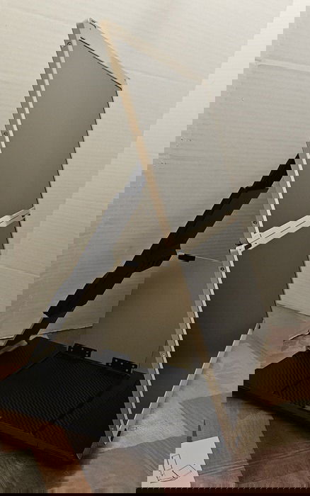 Two horizontal monitors stacked together.