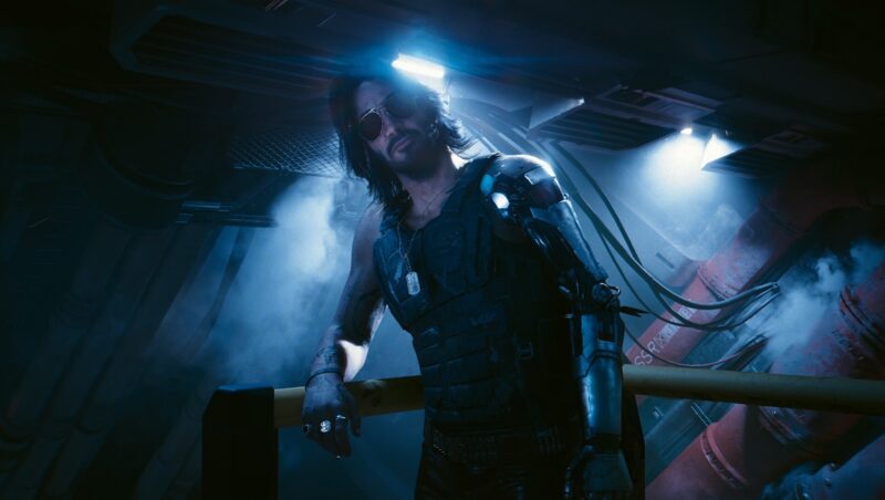 A screenshot from the open-world RPG game Cyberpunk 2077, showing Keanu Reeves as Johnny Silverhand. 