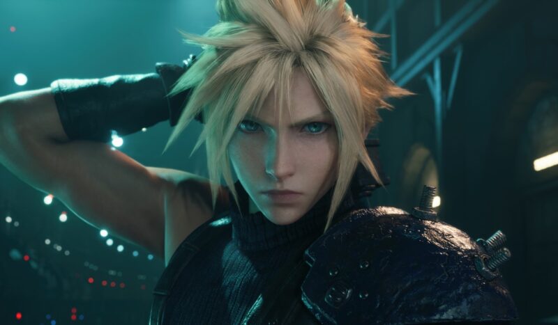 An image of Cloud Strife, the central character from Final Fantasy VII, with his hand behind his back, poised to draw his sword. 