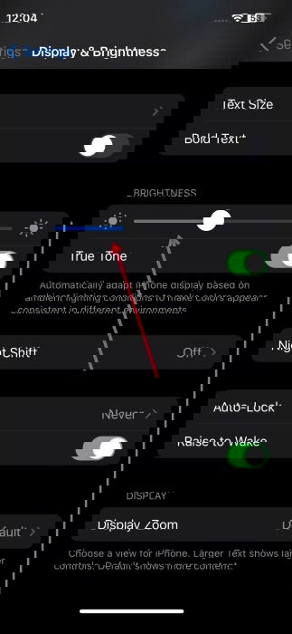 Top Tips Battery Life Reduce Brightness Adjusting brightness on iPhone.