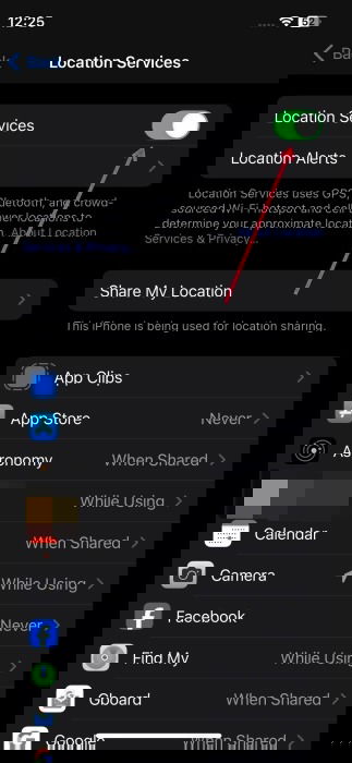 Toggling on "Location Services" switch in iPhone Settings.