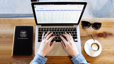 Laptop With Open Spreadsheet