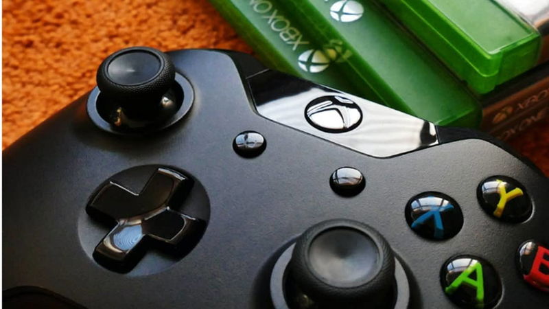 Xbox controller with games.