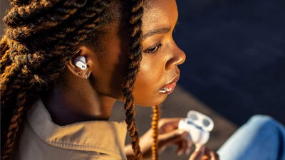 Person Wearing Beats Studio Buds