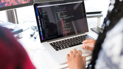 People At Computer Using Linux Command Lines