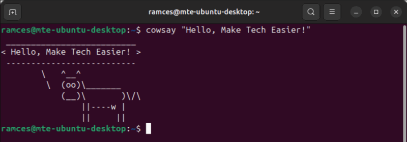 A terminal showing the default cowsay prompt.