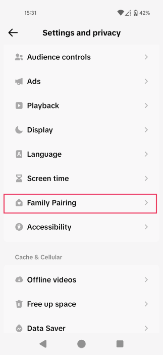 Tapping on "Family Pairing" option in TikTok app. 