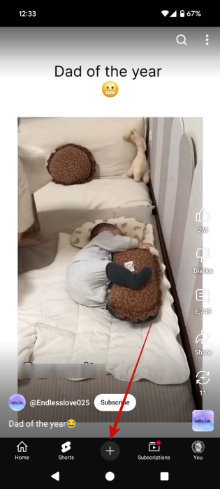 Tapping on plus button in YouTube app. 